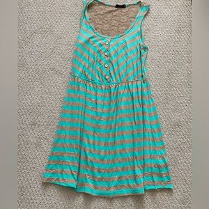 Cute green and tan striped dress with lace detail in the back